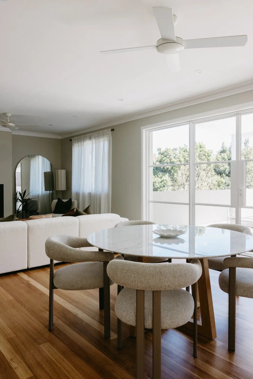 Living and dining room with the new doors and refinished timber floor