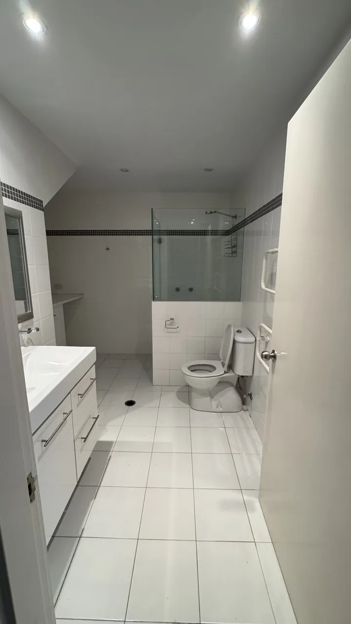 Second bathroom and laundry before renovation