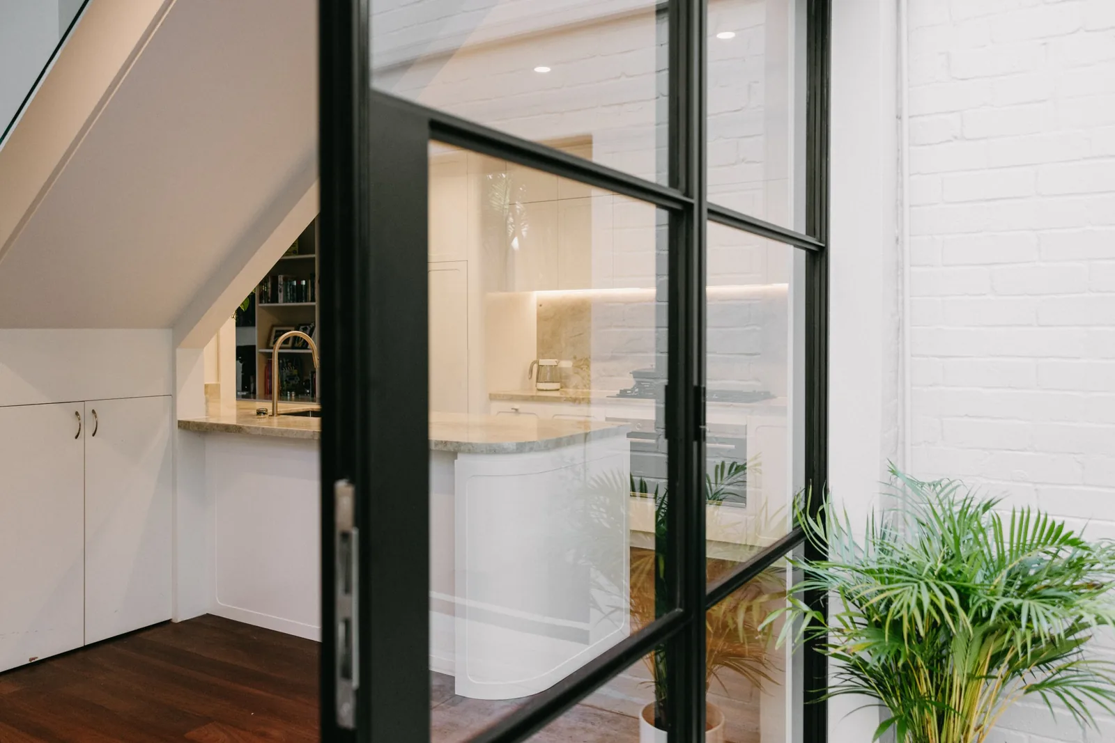 French doors open to the courtyard