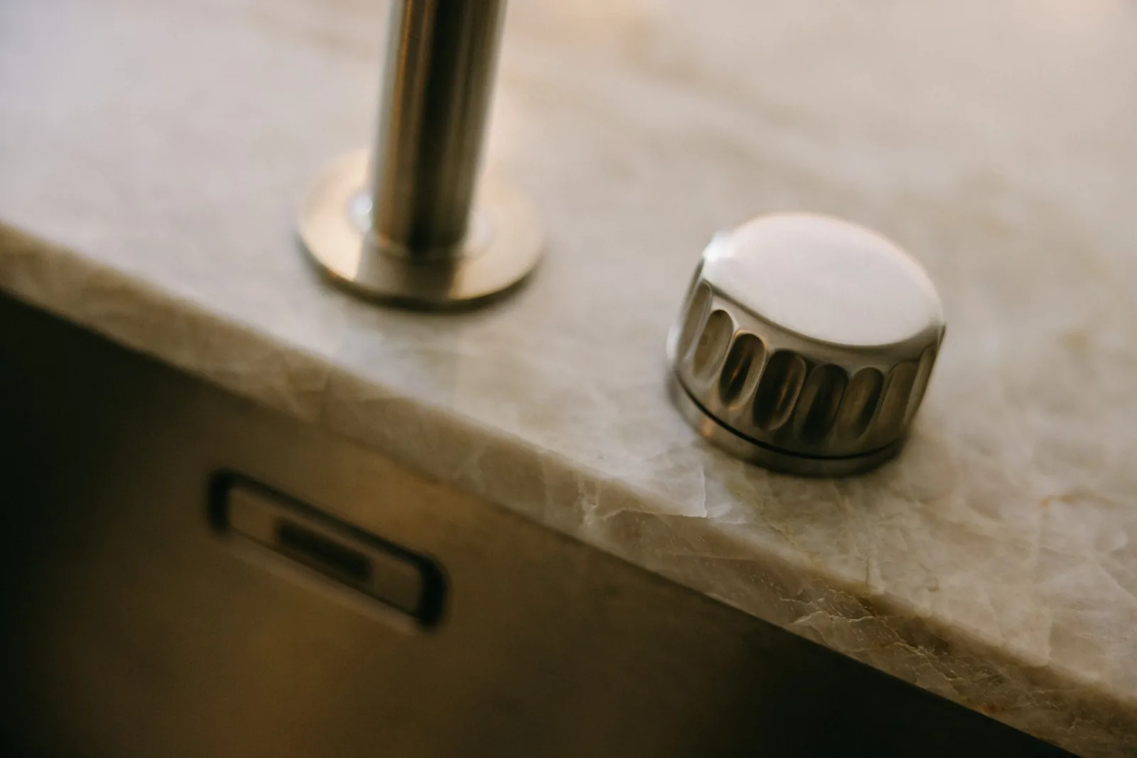 Tap and stone benchtop detail