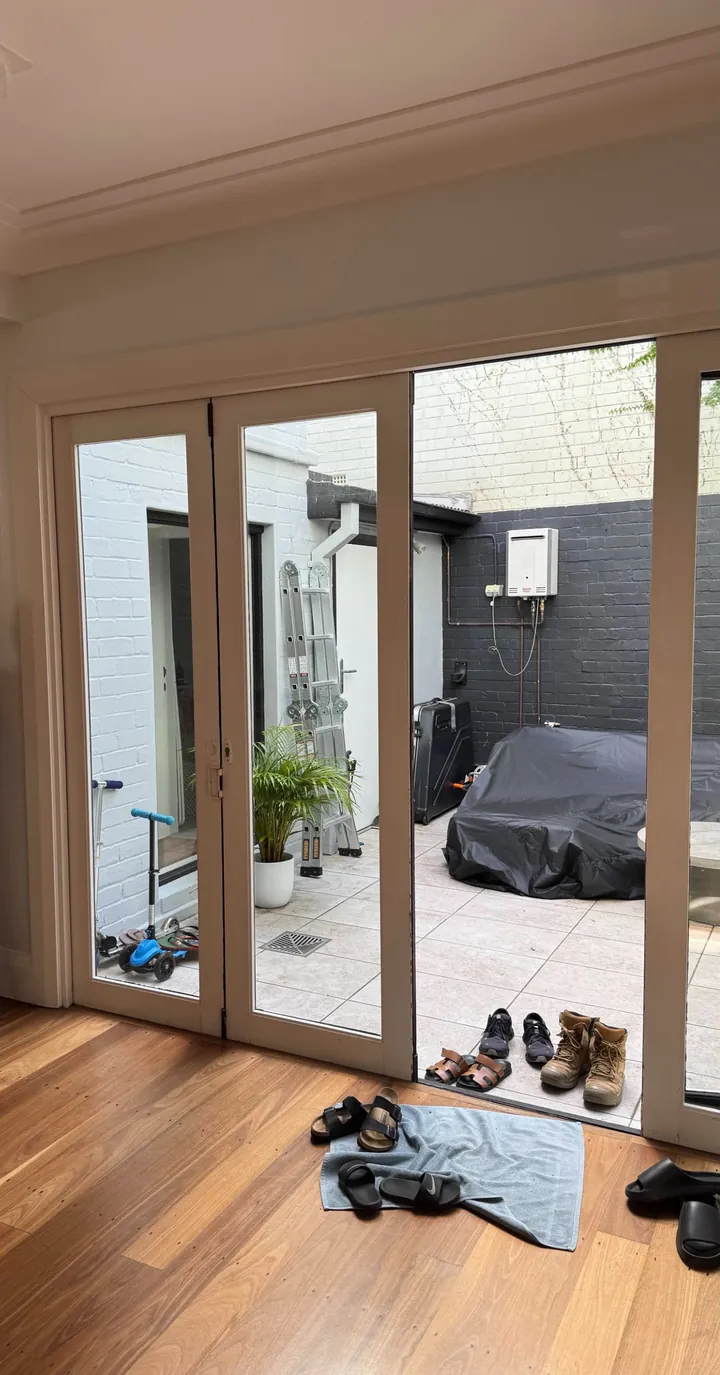 Old timber bifold doors before renovation